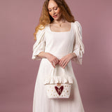 Clara ft. Flaming Heart Monogram Appliqué